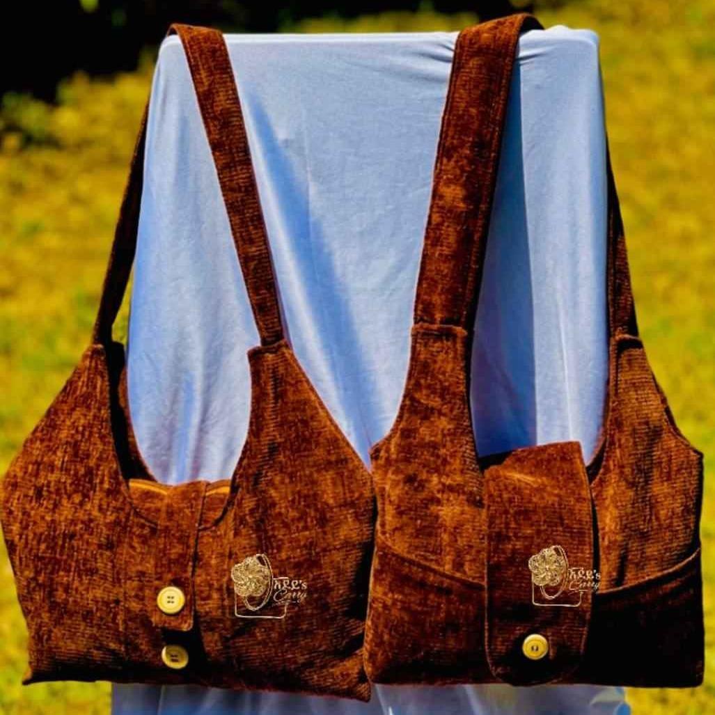 Adeys carry bag showcasing signature stitching, logo, and textured fabric with a spacious interior