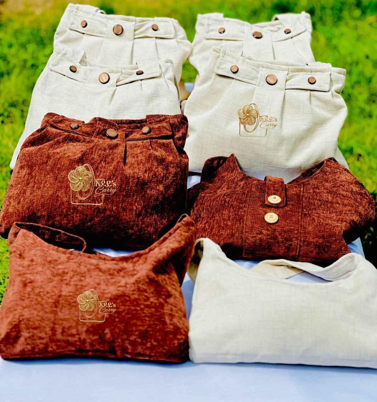 Adeys carry bag showcasing signature stitching, logo, and textured fabric with a spacious interior